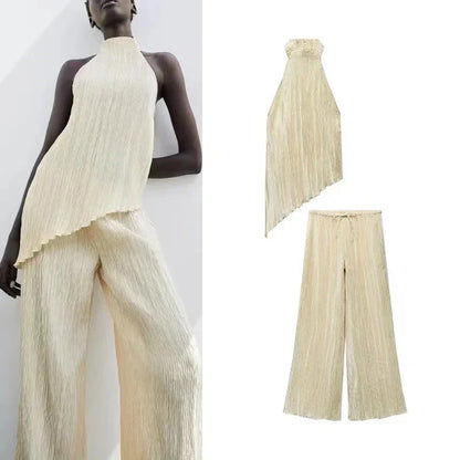 NAYLA – ASYM­METRI­SCHES ZWEITEILER-SET MIT ONE-SHOULDER UND PLISSEE-ROCK 1