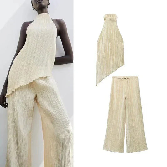 NAYLA – ASYM­METRI­SCHES ZWEITEILER-SET MIT ONE-SHOULDER UND PLISSEE-ROCK 1